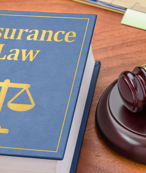 38365668 - a law book with a gavel - insurance law